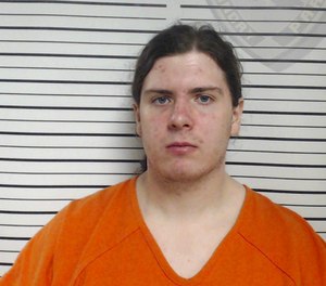 This booking image released by the Louisiana Office of State Fire Marshal shows Holden Matthews, 21, who was arrested Wednesday, April 10, 2019, in connection with suspicious fires at three historic black churches in southern Louisiana. Louisiana Office of State Fire Marshal via AP)