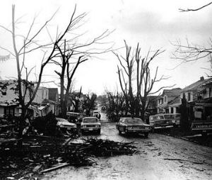 Streets littered with the debris of shattered homes and trees severely hampered travel, including rescue operations. (©1974 John Hultgren, Louisville, Kentucky)

