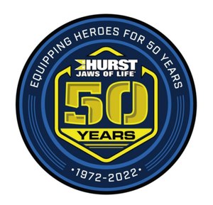 The anniversary logo appears on patches and coins.