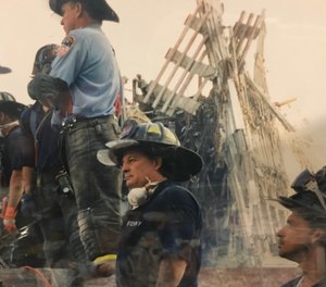 Dan Rowan (center) was hired with the FDNY on October 23, 1983.