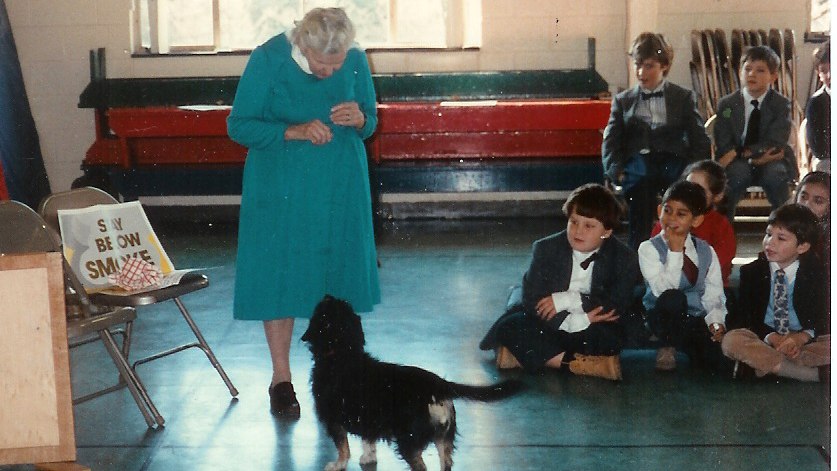 Dr. Anne Phillips, then in her mid-80s, on a fire safety classroom visit in Massachusetts in 2002 with her dog, Samantha (Sam).