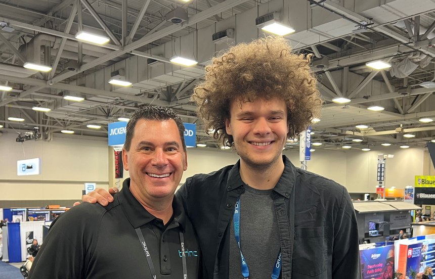 Don Redmond and Blake Resnick pictured in the BRINC booth at the IACP 2022 Annual Conference.