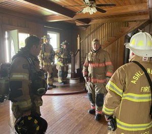 NFSA President Shane Ray talks to the firefighters before the fires