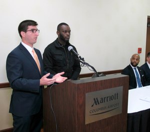 Attorney Solomon Radner, far left, and Shamieke Pugh discuss their new lawsuit against officers at an Ohio prison during a news conference with other lawyers involved on Wednesday, April 3, 2019, in Columbus, Ohio.