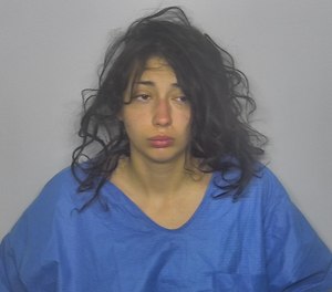 Hope Oller, 24, was arrested Wednesday for allegedly spitting on an EMT and kicking a nurse in the face.