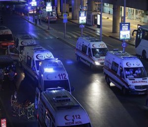 Turkish rescue services gather outside Istanbul's Ataturk airport Tuesday. (AP Photo/Emrah Gurel)