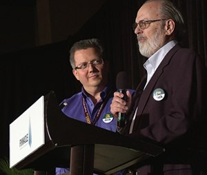 Jack Stout gives his acceptance speech as his son Todd Stout looks on.