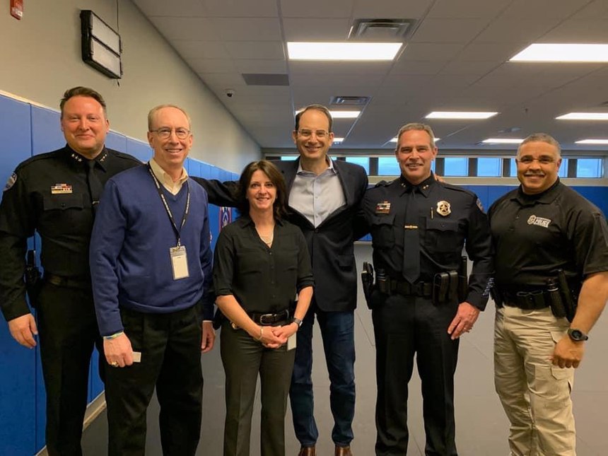 Fort Collins Police Services staff meet with Colorado Attorney General Phil Weiser during his visit to the agency’s P.O.S.T. certified police academy. Left to right: Chief Jeff Swoboda, Staff Psychologist Dr. Dan Dworkin, Academy Director Lt. Jackie Pearson, Colorado Attorney General Phil Weiser, Deputy Chief Greg Yeager, Corporal Al Brown.