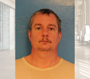 A reward of up to $7,500 is available for information on Johnny Shane Brown's whereabouts.