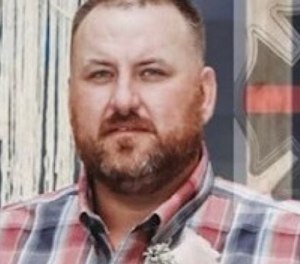 Firefighter Joshua Schwindt was searching for the victims of the crash when he made contact with a damaged power line.