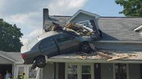Photos: Car goes airborne, crashes into second floor of Pa. house