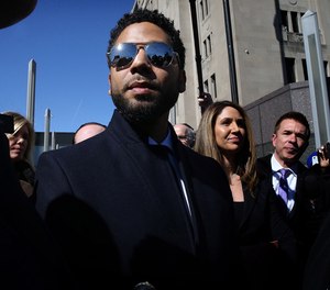 Actor Jussie Smollett leaves the Leighton Criminal Court building, after all charges were dropped in his disorderly conduct case on March 26, 2019.