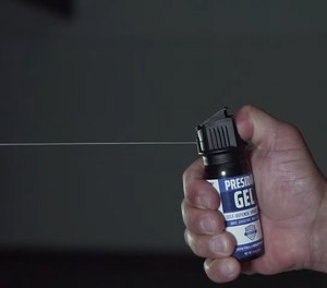 Someone demonstrates Presidia Gel, a less lethal product that can be used instead of pepper spray.