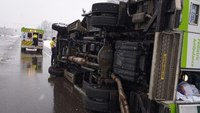 Mich. ambulance carrying 7 collides with snowplow, flips