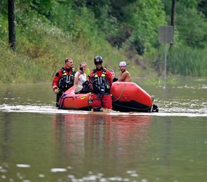 Severe and deadly floods in eastern Kentucky forced the evacuation of stranded people, as shown in this photo, and inmates from the Letcher County Jail.