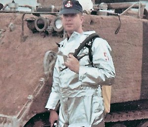 Rescue 5 Bill Killen poses in front of Armored Personnel Carrier #1 during the Apollo 8 Countdown Demonstration Test on Dec. 11, 1968.