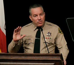 Los Angeles County Sheriff Alex Villanueva speaks during a swearing-in ceremony in Monterey Park, Calif. Villanueva will limit when inmates in the county's jails can be transferred to federal authorities for deportation (AP Photo/Jae C. Hong, File)