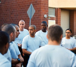 Recruits at the Los Angeles Police Academy they discuss tactical concepts during practical exercises. They are learning the building blocks to make sound decisions in potentially rapidly evolving situations.