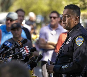 Police Chief Bryan Reyes holds a news conference in front of the police station in Palm Springs. (Photo/Los Angeles Times)