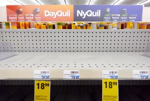 A cold and flu medicine shelf was empty in a CVS pharmacy on Dec. 6, 2022, in Burbank, California.