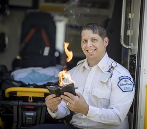 EMT/paramedic Ivan Mazurkiewicz uses magic tricks in the back of his ambulance to soothe his youngest patients. (Photo/Tribune News Service)