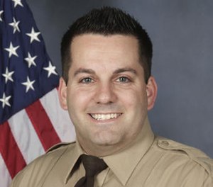 An undated photo provided by the St. Louis County Police Department shows St. Louis County Police officer Blake Snyder.