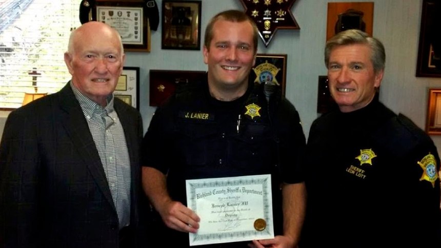 Colonel Joseph H. “Red” Lanier, pictured with his grandson, RCSD Deputy J.H. Lanier IV, and Richland County Sheriff Leon Lott.