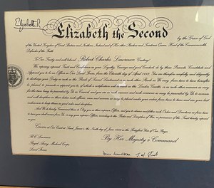 The commissioning scroll, presented to graduates from the Royal Military Academy, is signed by Queen Elizabeth, placing her “trust and confidence" in commissioned officers' "loyalty, courage and good conduct.”