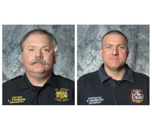 Cpt. Les Fryman and firefighter-paramedic Sean Davenport performed CPR on a woman who had a heart attack during a training conference. (Image courtesy Lexington Fire Department)
