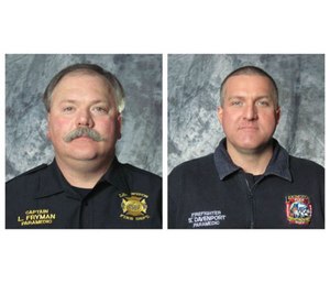 Cpt. Les Fryman and firefighter-paramedic Sean Davenport performed CPR on a woman who had a heart attack during a training conference. (Image courtesy Lexington Fire Department)