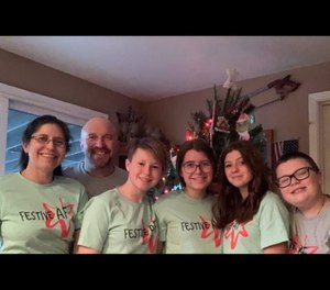 Kirsten Liebendorfer, left, and her family
