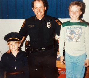 Author Chris Littrell (left) in his Halloween cop uniform, pictured with his father and his brother, an Air Force Security Police veteran, standing in the Seahawks PJs. (Photo/Chris Littrell)
