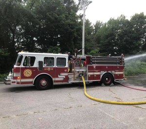 A firefighter was transported to a hospital in an ambulance Sunday after he went into the station and discovered the utility fire truck had been running since Friday night. The matter is under investigation, Town Manager Amanda Allen said.