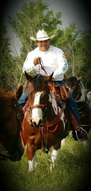 Lozano leading a trail ride for the CareFlite Mounted Equine EMS Team.