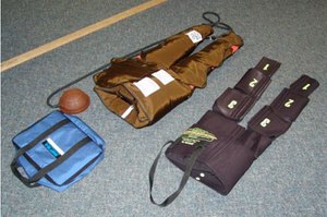 Mmilitary anti-shock trousers (left) and non-inflatable anti-shock garment