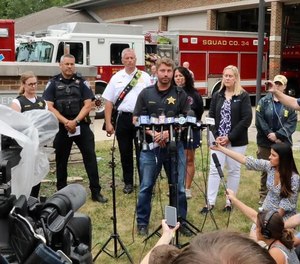 Deputy Chief Chris Covelli of the Lake County (Illinois) Sheriff’s Office addresses the media about the mass shooting at a July 4 parade in Highland Park, Illinois in 2022.