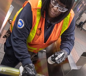 A New York City Metropolitan Transportation Authority worker sanitizes surfaces in high-traffic areas. Image: Patrick Cashin / MTA New York City Transit