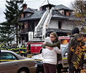 The owner of an apartment house where six people died in a fire that started hours after a Halloween party has been indicted on six counts of manslaughter, authorities announced Friday. (AP Photo/Robert F. Bukaty, File)