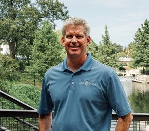 Former police officer Mark Phillips, who now owns and operates a Signal 88 Security franchise, says Signal 88 helps him manage daily administrative operations while applying his policing skills. (photo/Signal 88)