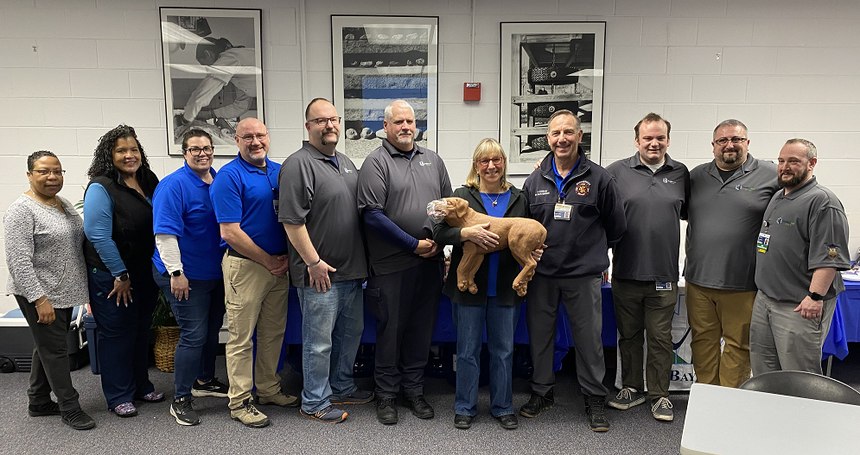 MassBay Community College students work with actual dogs and on dog mannequins.