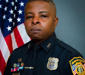 Officer Geoffrey Redd served in the U.S. Marine Corps before joining the police department in 2008.