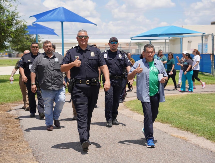 Chief Flores and officers participate in a Mental Health Awareness Walk. Prioritizing officer wellness is key at the Alton PD.