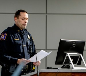 Interim Police Chief David Kiddle speaks during a Grand Rapids City Commission meeting that had a crowd of protesters in Grand Rapids, Mich. (Cory Morse/The Grand Rapids Press via AP)