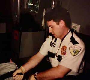 New York Congressional hopeful Michael DeCillis shared this photo of himself on his public Facebook page, calling for higher wages for EMTs.