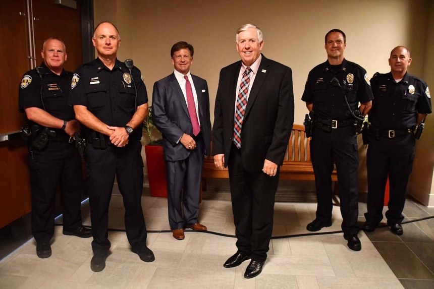 Capt. Michael Defoe, an MS-LEPSL graduate, is shown here with the Town & Country Police Department Command Staff and the Missouri state governor. From left to right: Lt. John Flanagan (retired), Chief James Cavins, former Town and Country Mayor Jon Dalton, Missouri Governor Mike Parsons, Captain/Asst. Chief of Police Michael DeFoe and Lt. Tom Walker (retired).