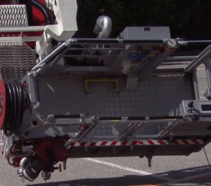 A firefighter was killed after he was electrocuted during a demonstration of an aerial device with four children in the bucket with him. (Photo/Salzburg 24)