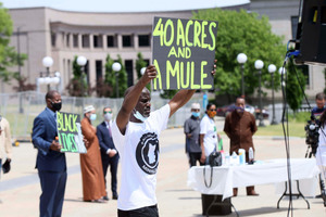 People demonstrate at the Minnesota State Capitol in St. Paul, Minn. on Friday, June 19, 2020, to mark Juneteenth. Anger over ongoing economic inequities has been a major part of recent protests. Image: AP Photo/Jim Mone