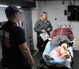 The program uses realistic training mannequins that are controlled by the simulation's instructors in another room.
