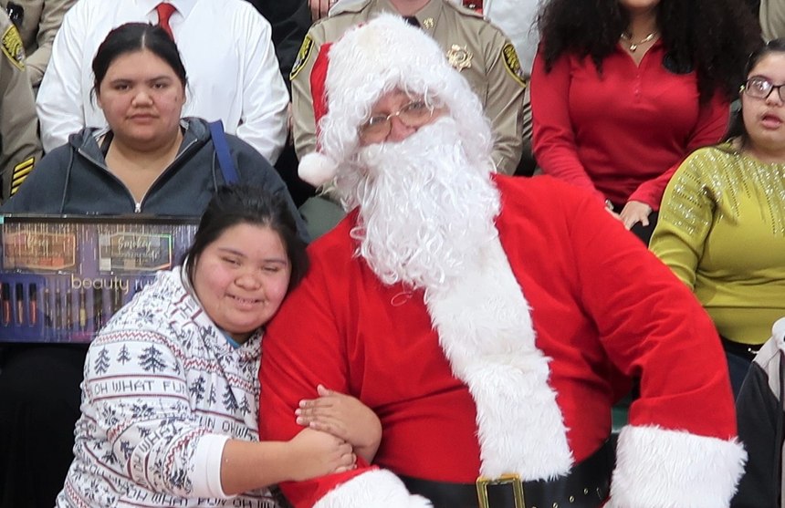Sgt. Manuel Correia (ret.) volunteered as Santa for the students with special needs at RFK High School.