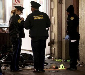 New Orleans Police investigate a shooting a fatal shooting early Sunday, Nov. 27, 2016, in New Orleans.